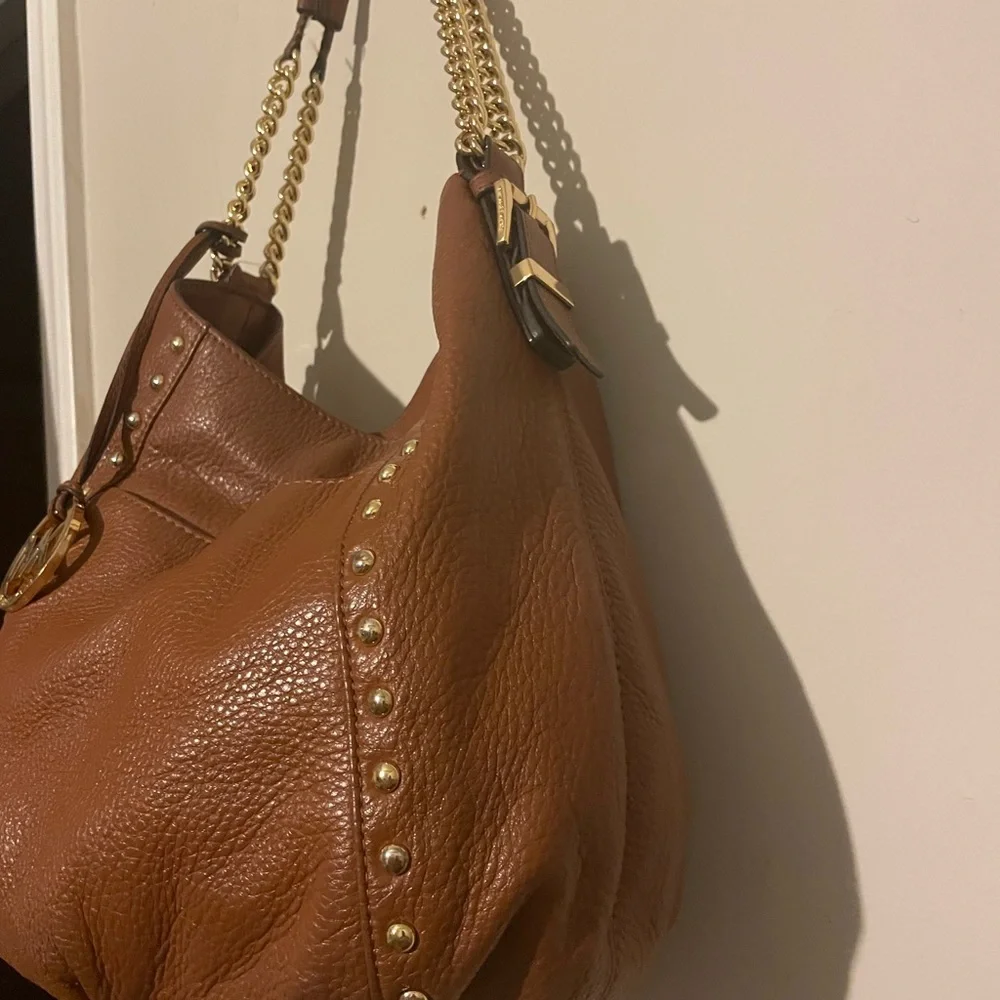 Michael Kors cognac pebbled leather hobo bag w hang tag